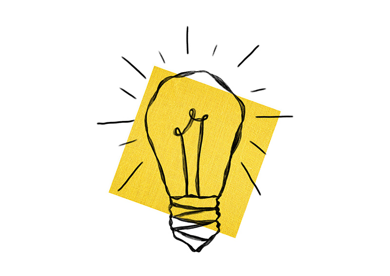 Lightbulb graphical drawing on yellow backscreen