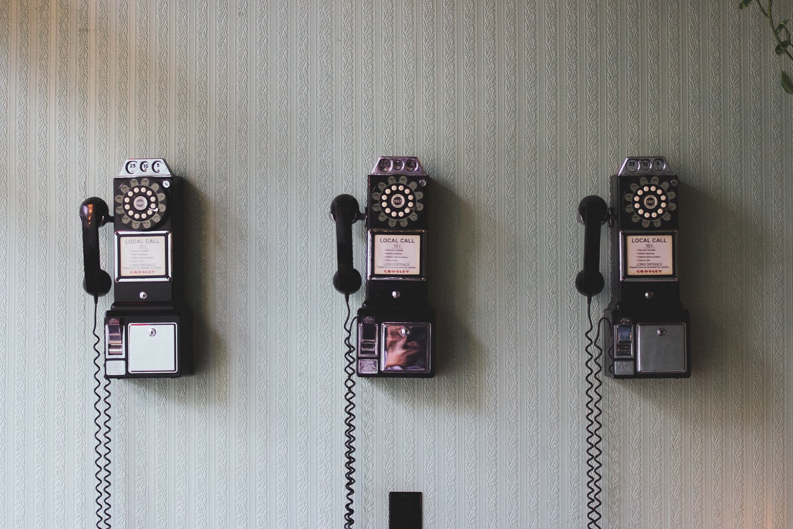 Three wall phones