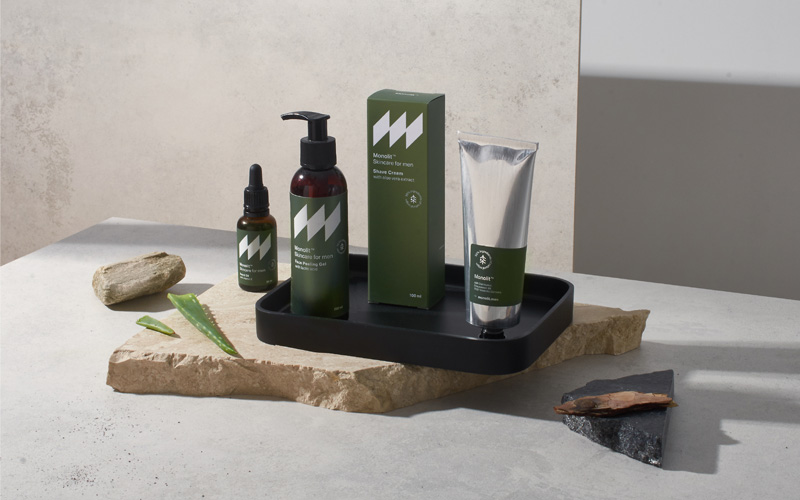 A set of grooming products in dark khaki green color