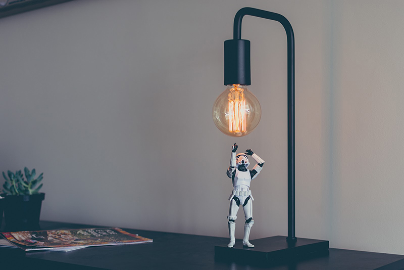 Stormtrooper trying to reach lightbulb