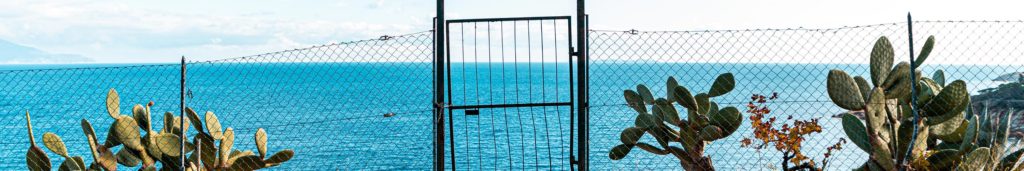 closed gate to the beautiful seaside