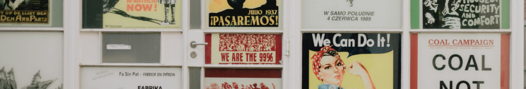 an image of various posters on the wall